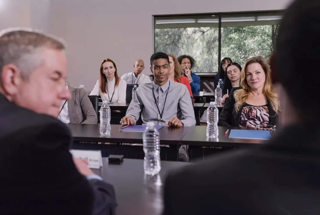 Professional people in a congress venue planning setting