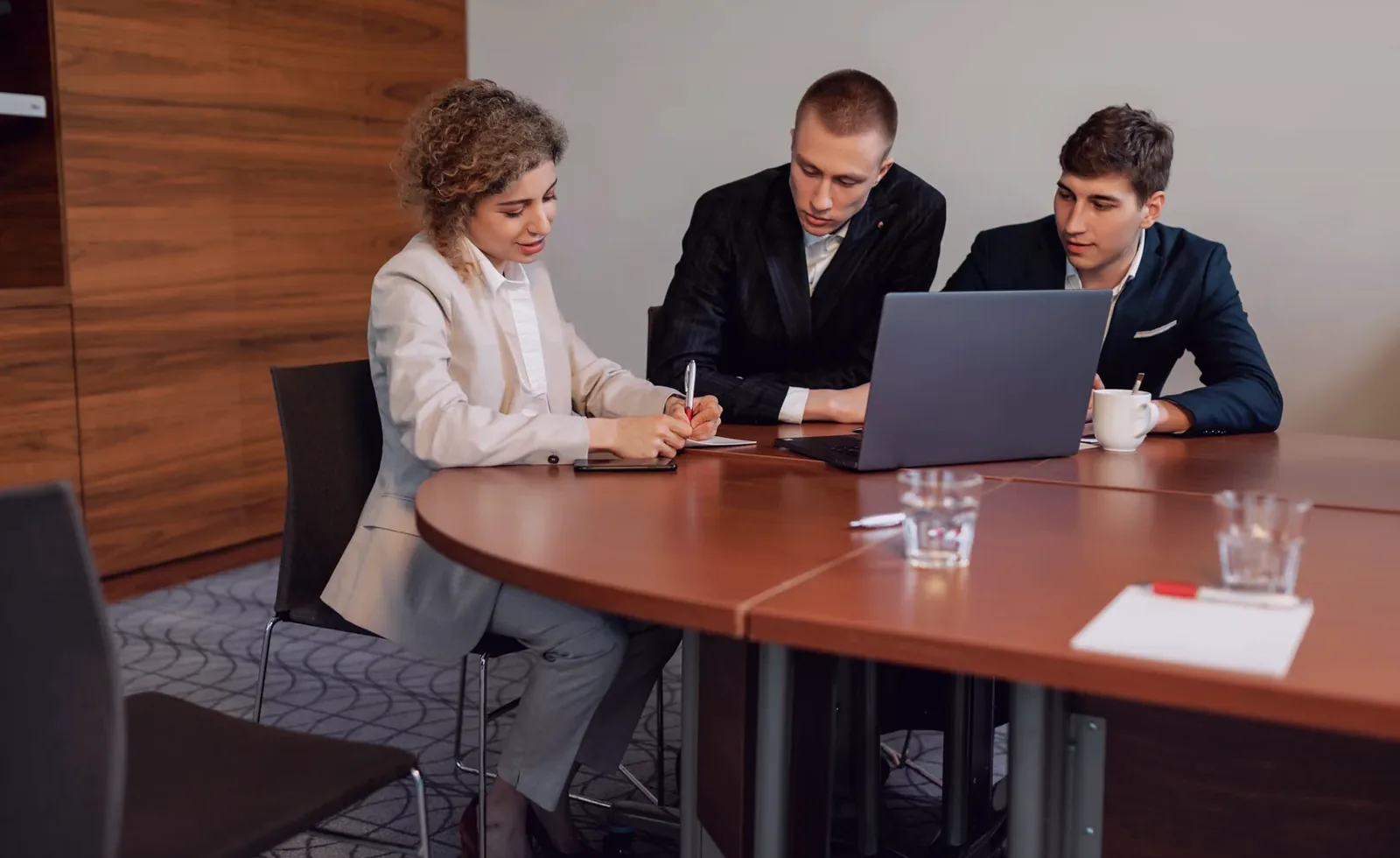 Business professionals at a congress planning venue